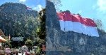 HUT Ke-81 RI, Mapala 45 Universitas Bosowa Bentangkan Bendera Raksasa di Tebing Setinggi 150 Meter di Mengkendek